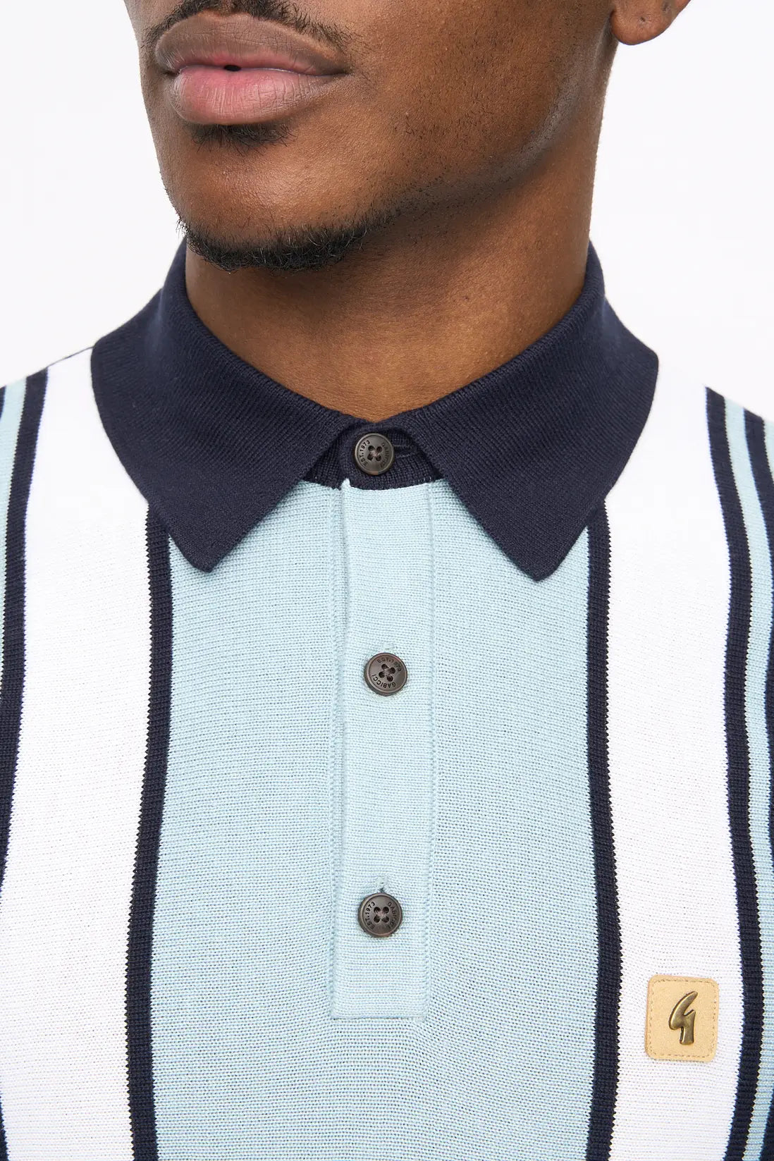 Gabicci Vintage Searle stripe navy knitted polo shirt, close-up of the blue knitwear with white and red stripe details, XL size.