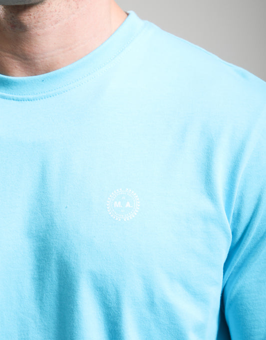 Marshall Artist Delta T-Shirt in cyan featuring a logo design, casual fit, and soft fabric, ideal for everyday wear.