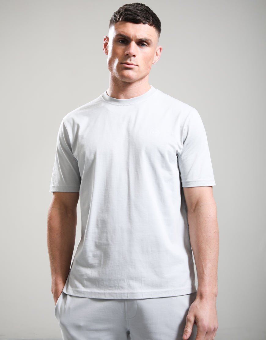 Marshall Artist Delta T-Shirt in Oceanic Grey with logo, casual fit, soft fabric, displayed on a hanger.
