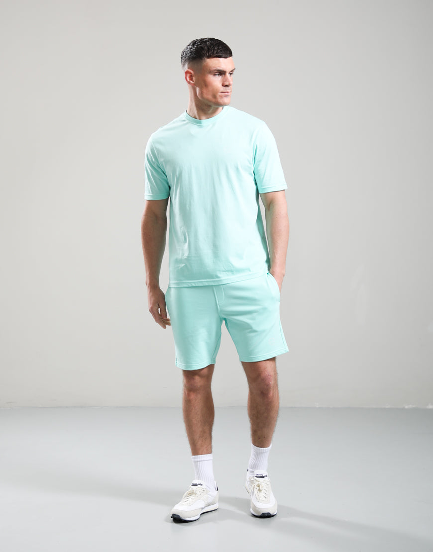 Mint green Marshall Artist Delta T-Shirt featuring a logo print on the front, casual fit, and soft cotton fabric.