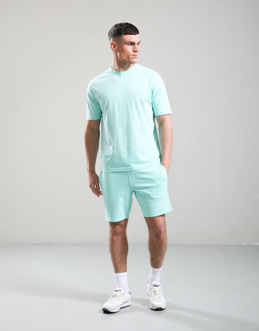 Mint green Marshall Artist Delta T-Shirt featuring a logo print on the front, casual fit, and soft cotton fabric.