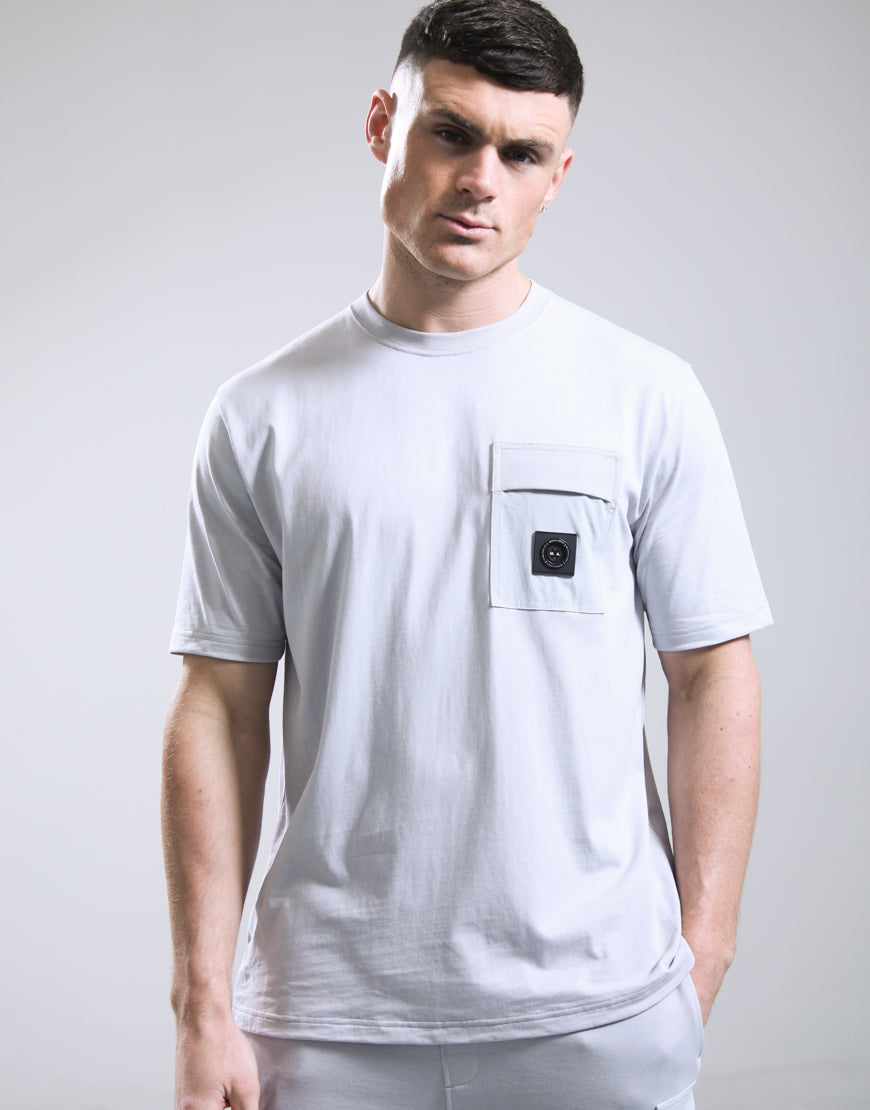 Marshall Artist Kyoto Pocket T-Shirt in Oceanic Grey laid flat, showing the chest pocket and soft cotton fabric.