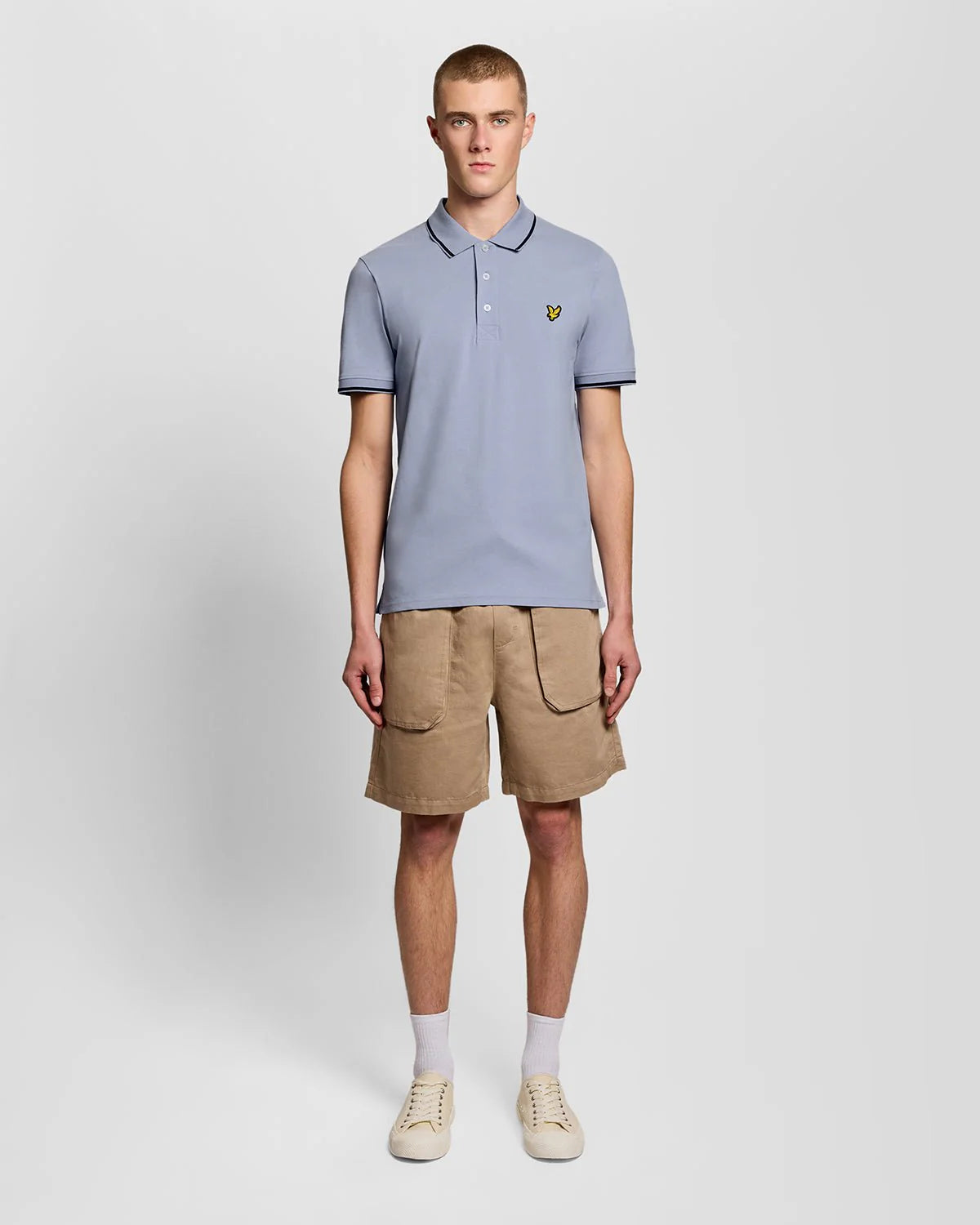 Lyle & Scott men's tipped polo shirt in Bubble Blue and Jet Black, featuring a classic fit and ribbed collar.