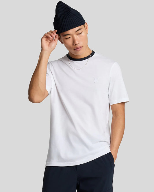 Men's Lyle & Scott contrast T-shirt in white and navy, featuring a classic crew neck and logo detail.