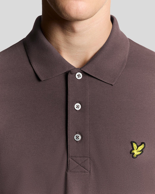 Men's Lyle & Scott cotton polo shirt in espresso color, featuring a classic collar and short sleeves, on a neutral background.